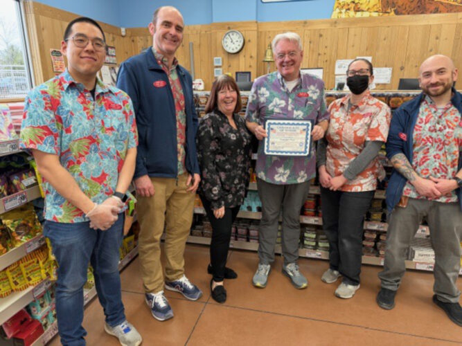 Elks recognize Trader Joe’s for flag display